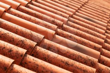 Red roof tiles, close-up photo with selective focus