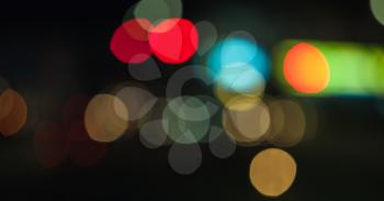 Blurred lights, bokeh optical effect. Abstract background photo