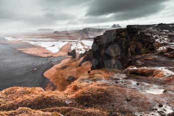 Icelandic scenic coastal landscape. North Atlantic Ocean coast, black sand beach, Vik district, Iceland