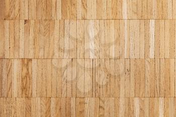 Oak parquet made of wooden planks. Flat background photo texture