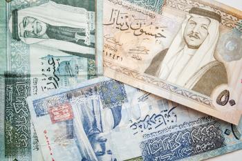 Jordanian dinars, banknotes with kings portraits close-up, background photo