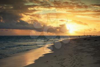 Sunrise over Atlantic ocean. Dominican republic, Punta Cana beach landscape. Colorful tonal correction photo filter effect
