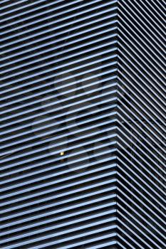 Abstract architecture background with striped metal walls