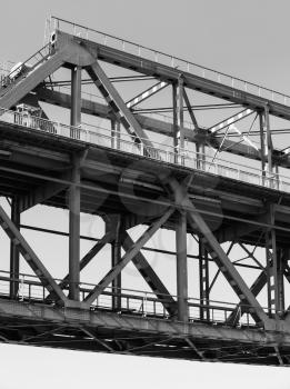 Steel truss bridge construction fragment, black and white photo