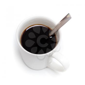 Black coffee in white cup with spoon on white background