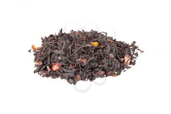 Mixed black Truffle tea with crushed cocoa beans, red pepper peas and dry fruits, small pile isolated on white, selective focus with shallow DOF