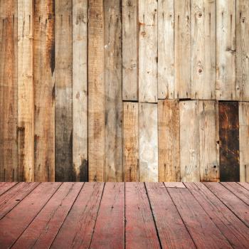 Empty grungy wooden interior background with red floor
