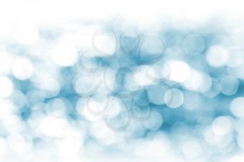 Defocused blue lights abstract background. Natural photo bokeh patten