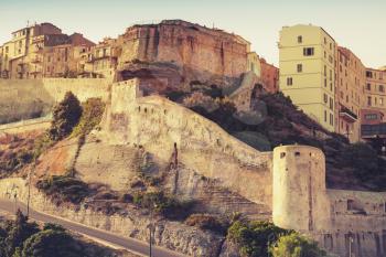 The citadel of Bonifacio, mountainous Mediterranean island Corsica, Corse-du-Sud, France. Photo with warm vintage tonal correction filter, old style effect