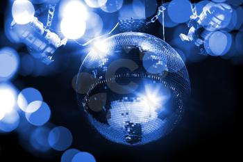 Blue disco background with mirror ball and lights