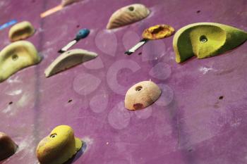 Colorful modern climbing wall details macro photo