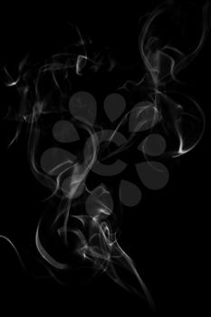 Abstract white flowing smoke background on black 