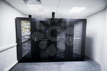 Server room interior with black metal computer cabinets