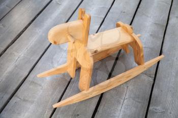Traditional Scandinavian wooden rocking horse toy 