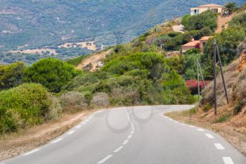 Turning mountain highway, road landscape of Corsica, France