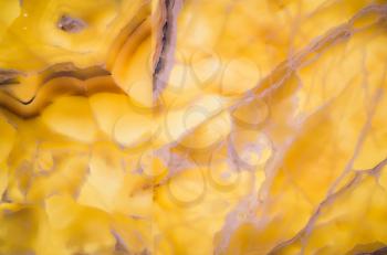 Honey onyx wall panel, close up background photo texture