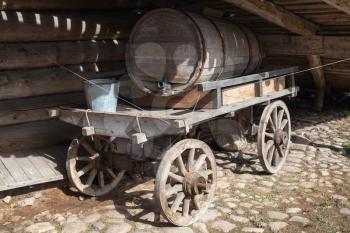 Old rural wooden cart with water tank