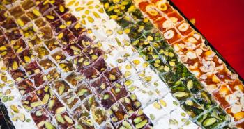 Assortment of Turkish delight. Traditional cuisines of the former Ottoman Empire and the Middle East. Photo with selective focus