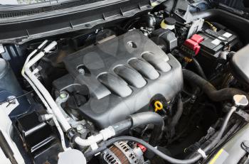 Modern suv car undersquare engine under oped hood
