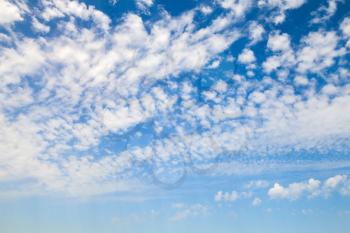 Natural blue sky with white altocumulus clouds, background photo texture