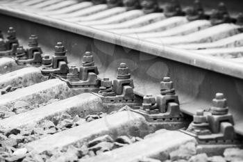 Modern railway track details, close up photo with selective focus