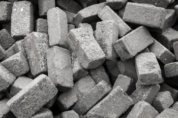 Pile of rough gray stones for cobble road paving, close-up