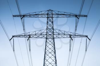 Transmission power tower, electricity pylon fragment. Steel lattice tower, used to support an overhead power line