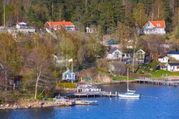 Swedish rural landscape, coastal village with wooden houses