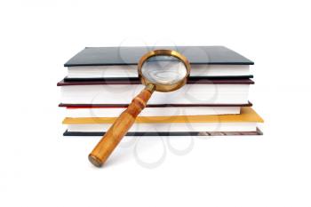 Old style magnifying glass isolated on white