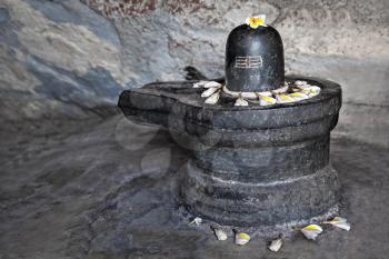 Monolith shiva lingam in the cave, India