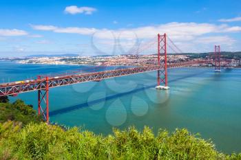 The 25 de Abril Bridge is a bridge connecting the city of Lisbon to the municipality of Almada on the left bank of the Tejo river, Lisbon