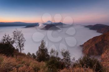 Bromo, Batok and Semeru volcanoes at sunrise, Java island, Indonesia