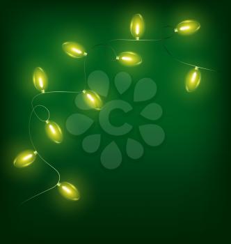 Glowing yellow twisted led Christmas lights garland on green background