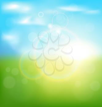 Abstract spring background with sunrise and green grass