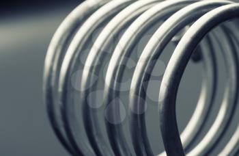 Aluminum spirals isolated on gray background