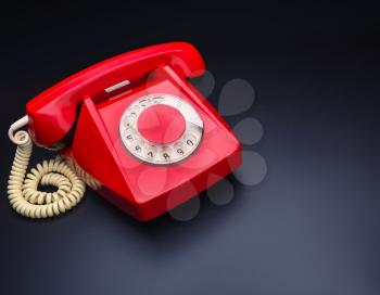 Macro of vintage red telephone with copyspace