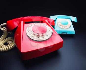 Vintage red and blue telephones