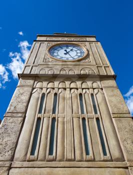 Tall british tower with clock