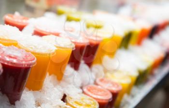 Fresh fruits juices chilled in ice
