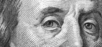 Close-up of one hundred bill Franklin portrait