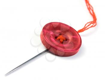 Sewing needle with button