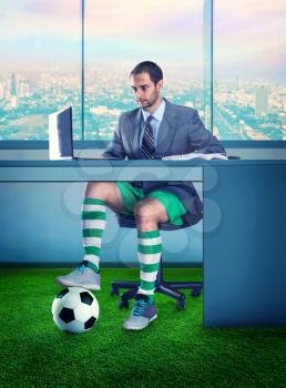 Businessman in shorts and with a ball under the table