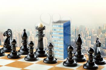 Skyscraper instead of king among the black figures