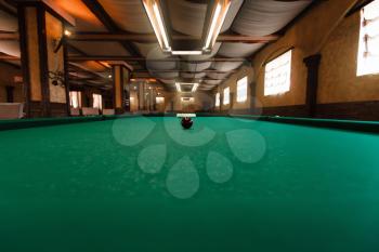 Billiard table with balls prepared for play