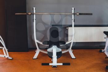 Sport machine in the gym for bar lifting