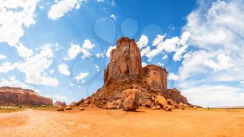 Desert sandstone mountains and cloudy sky landscape at Monument Valley National Tribal Park, Navajo, Utah USA