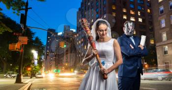 Maniac couple with bloody bat and meat cleaver in night city. Groom in hockey mask