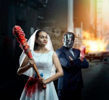 Maniac couple with bloody bat and meat cleaver in night city. Groom in hockey mask