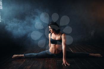 Grace female dancer, contemp dance. Gymnastic exercise in ballroom