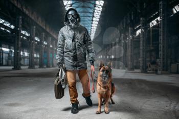 Stalker in gas mask and pet in abandoned building, survivors after nuclear war. Post apocalyptic world. Post-apocalypse lifestyle on ruins, doomsday, judgment day 